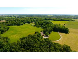 TRACTS 1 & 2 - REAL ESTATE AUCTION - 2 PRESTIGUOUS HOMES - 66+/- ACRES IN 5 TRACTS IN NOBLE COUNTY, INDIANA